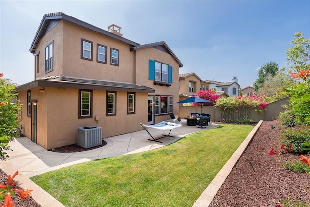 15530 New Park Ter, San Diego, CA 92127 - back of property with central AC unit, a patio area, stucco siding, and an outdoor living space