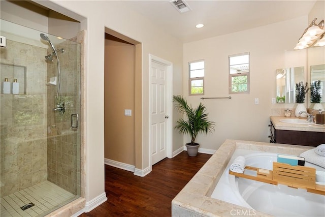 15530 New Park Ter, San Diego, CA 92127 - full bathroom featuring a shower stall, vanity, a garden tub, wood finished floors, and baseboards