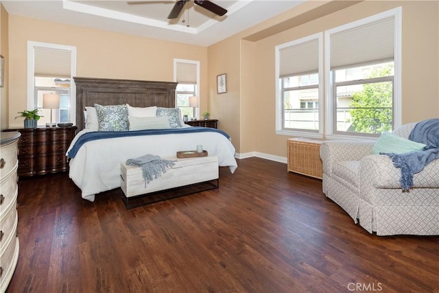 15530 New Park Ter, San Diego, CA 92127 - bedroom with dark wood-style flooring, baseboards, a ceiling fan, and a tray ceiling