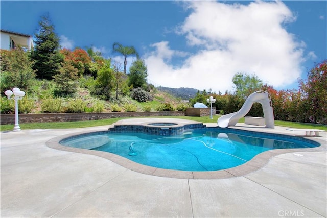 12949 Pinewood Ln, Yucaipa, CA 92399 - swimming pool featuring a water slide, an in-ground hot tub, a patio, and a diving board