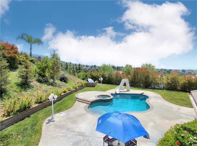 12949 Pinewood Ln, Yucaipa, CA 92399 - outdoor pool featuring a water slide, a patio, an in-ground hot tub, and a lawn