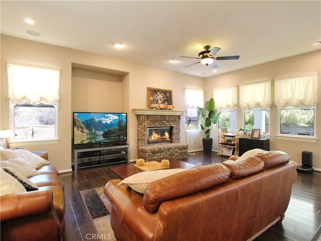 12949 Pinewood Ln, Yucaipa, CA 92399 - living area with baseboards, ceiling fan, wood finished floors, a brick fireplace, and recessed lighting