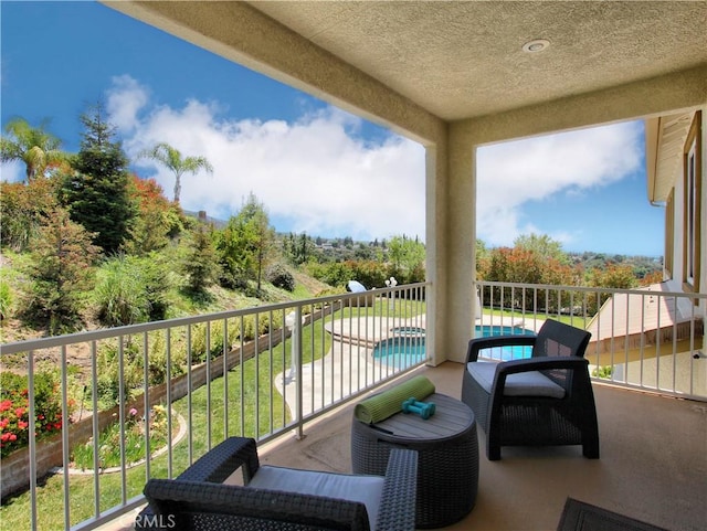 12949 Pinewood Ln, Yucaipa, CA 92399 - balcony featuring view of pool
