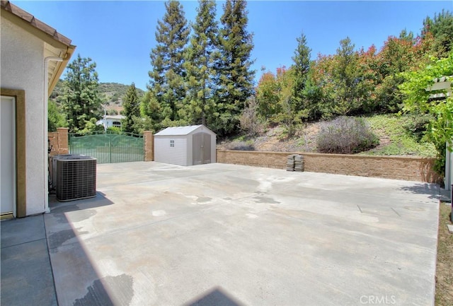 12949 Pinewood Ln, Yucaipa, CA 92399 - view of patio featuring central AC unit
