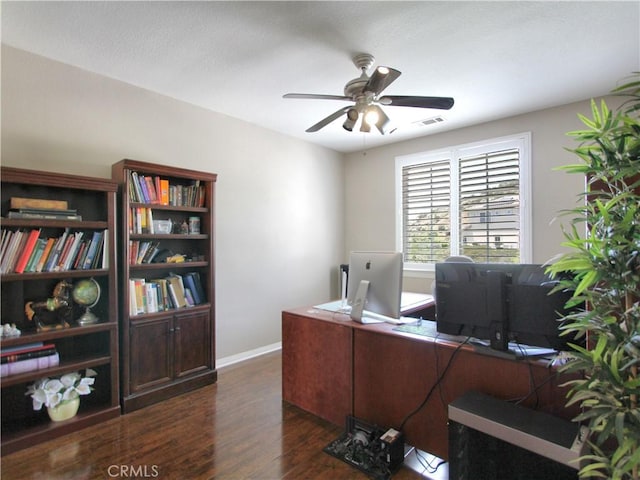 12949 Pinewood Ln, Yucaipa, CA 92399 - office featuring a ceiling fan, dark wood-type flooring, and baseboards