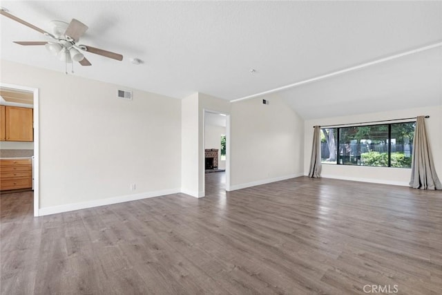 2472 Forbes Ave, Claremont, CA 91711 - unfurnished living room featuring lofted ceiling, wood finished floors, ceiling fan, and baseboards