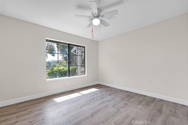 2472 Forbes Ave, Claremont, CA 91711 - unfurnished room featuring baseboards, wood finished floors, and a ceiling fan