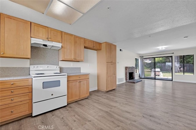 2472 Forbes Ave, Claremont, CA 91711 - kitchen with under cabinet range hood, white range with electric cooktop, light wood finished floors, open floor plan, and light brown cabinets