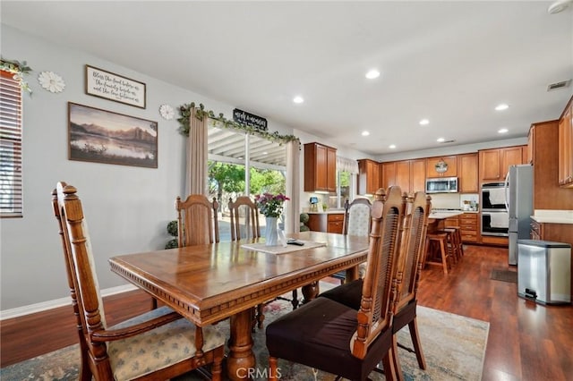 6688 Banyan Ave, Hesperia, CA 92345 - dining room with recessed lighting, dark wood-type flooring, and baseboards