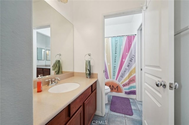 6688 Banyan Ave, Hesperia, CA 92345 - bathroom with toilet, vanity, tile patterned flooring, and a shower with shower curtain