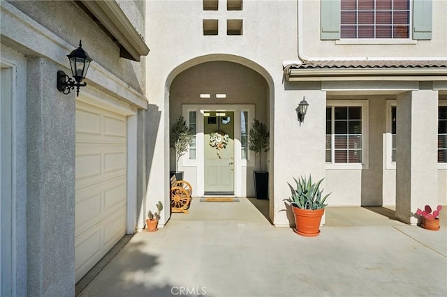 6688 Banyan Ave, Hesperia, CA 92345 - entrance to property with stucco siding and a garage