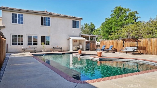 6688 Banyan Ave, Hesperia, CA 92345 - view of swimming pool with a patio and a pool with connected hot tub