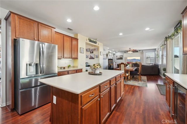 6688 Banyan Ave, Hesperia, CA 92345 - kitchen featuring stainless steel refrigerator with ice dispenser, wine cooler, dark wood finished floors, a center island, and recessed lighting
