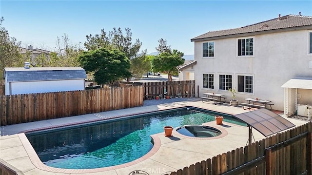 6688 Banyan Ave, Hesperia, CA 92345 - view of pool featuring a fenced backyard, a patio, and a pool with connected hot tub