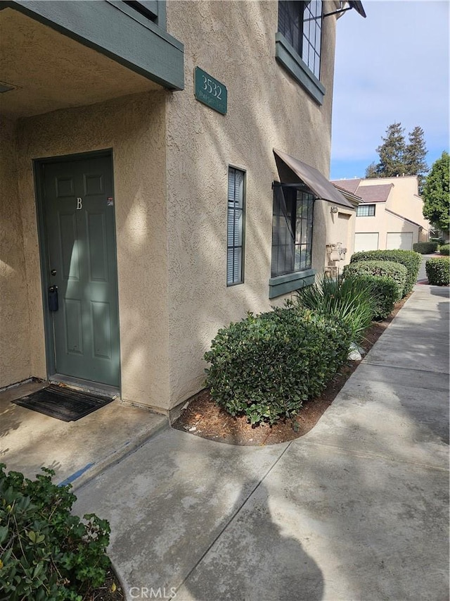 3532 W Stonepine Ln Unit B, Anaheim, CA 92804 - property entrance featuring stucco siding