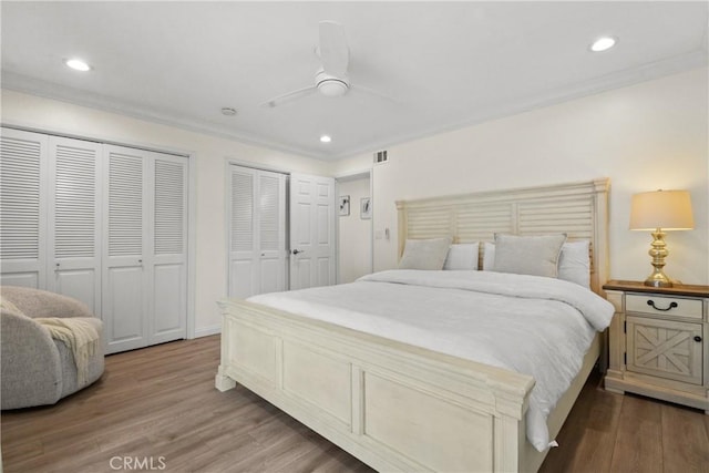 1420 Bookman Ave, Walnut, CA 91789 - bedroom with two closets, wood finished floors, crown molding, recessed lighting, and ceiling fan