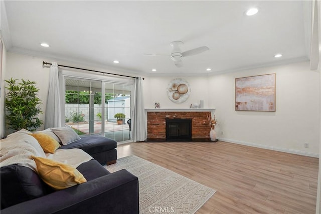 1420 Bookman Ave, Walnut, CA 91789 - living room with light wood-style floors, ceiling fan, baseboards, crown molding, and recessed lighting