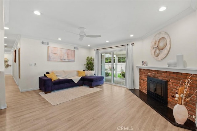 1420 Bookman Ave, Walnut, CA 91789 - living area with wood finished floors, a ceiling fan, recessed lighting, a brick fireplace, and baseboards