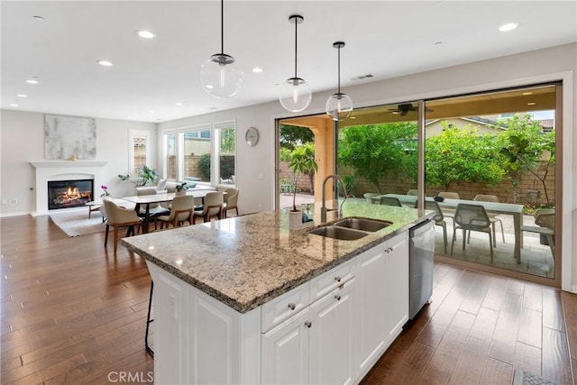 323 La Ventana Dr, Brea, CA 92823 - kitchen with a sink, stainless steel dishwasher, dark wood finished floors, recessed lighting, and an island with sink