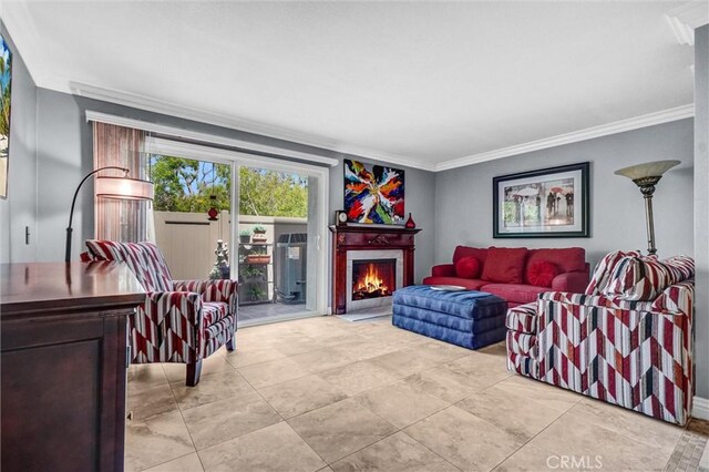 5927 E Creekside Ave Unit 18, Orange, CA 92869 - living area featuring ornamental molding, a fireplace with flush hearth, and light tile patterned flooring
