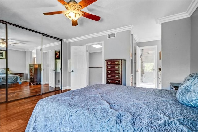 5927 E Creekside Ave Unit 18, Orange, CA 92869 - bedroom featuring wood finished floors, crown molding, a ceiling fan, ensuite bathroom, and baseboards