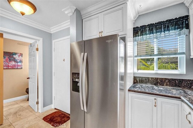 5927 E Creekside Ave Unit 18, Orange, CA 92869 - kitchen featuring stainless steel fridge with ice dispenser, crown molding, white cabinetry, and dark stone countertops