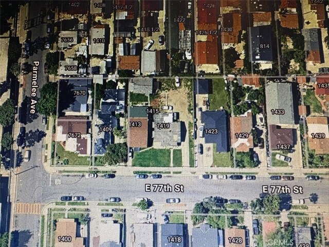 1413 E 77th St, Los Angeles, CA 90001 - aerial view of property's location with property boundaries highlighted