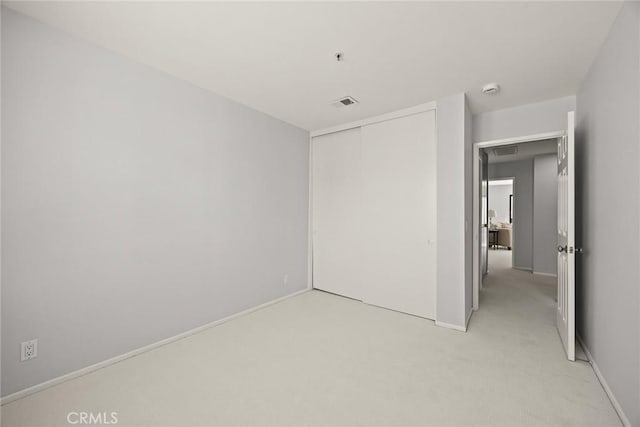 32 N 4th St Unit B, Alhambra, CA 91801 - unfurnished bedroom featuring light colored carpet, a closet, and baseboards