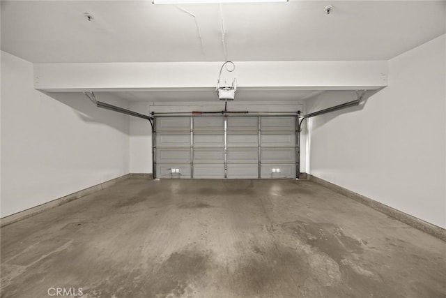 32 N 4th St Unit B, Alhambra, CA 91801 - garage featuring a garage door opener and baseboards