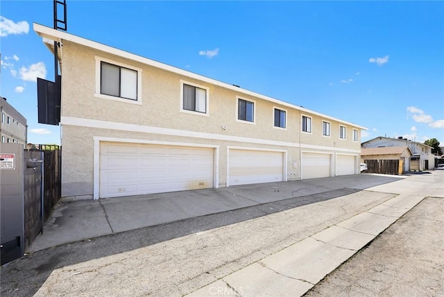 32 N 4th St Unit B, Alhambra, CA 91801 - view of front of house featuring stucco siding and a garage