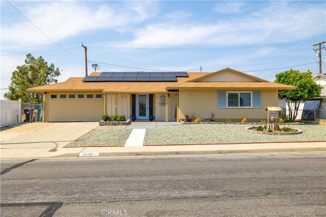 26190 Ridgemoor Rd, Menifee, CA 92586 - single story home featuring an attached garage, driveway, and solar panels