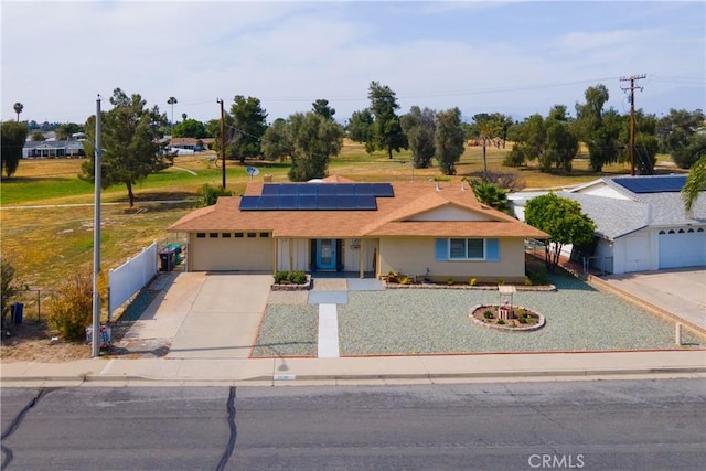 26190 Ridgemoor Rd, Menifee, CA 92586 - single story home featuring a garage, concrete driveway, and solar panels