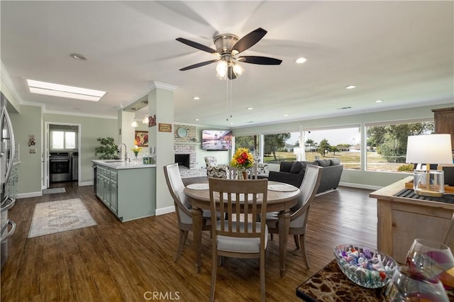 26190 Ridgemoor Rd, Menifee, CA 92586 - dining room with ornamental molding, dark wood-style flooring, a ceiling fan, and recessed lighting