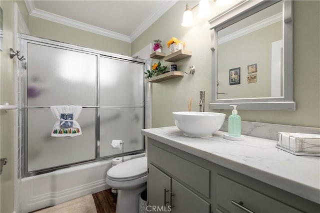 26190 Ridgemoor Rd, Menifee, CA 92586 - bathroom with vanity, crown molding, combined bath / shower with glass door, toilet, and wood finished floors