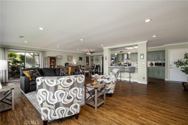 26190 Ridgemoor Rd, Menifee, CA 92586 - living room featuring recessed lighting, crown molding, dark wood-style floors, and a ceiling fan