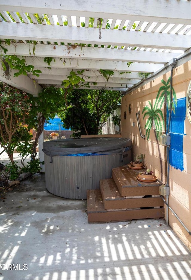 1207 S L St, Oxnard, CA 93033 - view of patio / terrace with a hot tub and a pergola