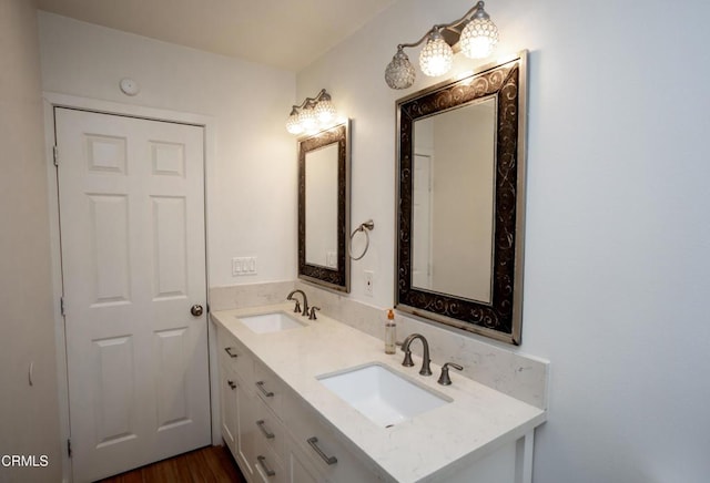 1207 S L St, Oxnard, CA 93033 - full bathroom featuring double vanity and wood finished floors