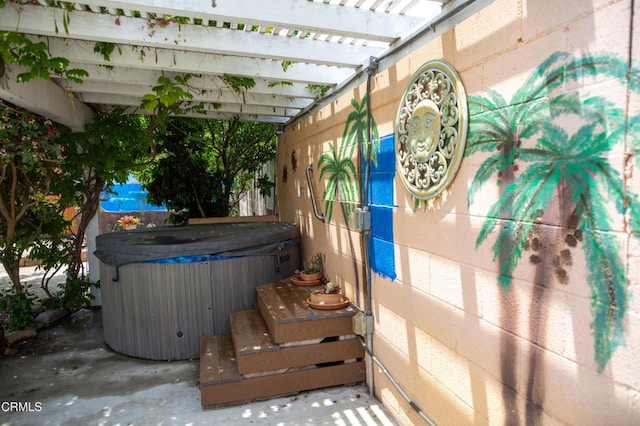 1207 S L St, Oxnard, CA 93033 - view of patio / terrace featuring a hot tub and a pergola