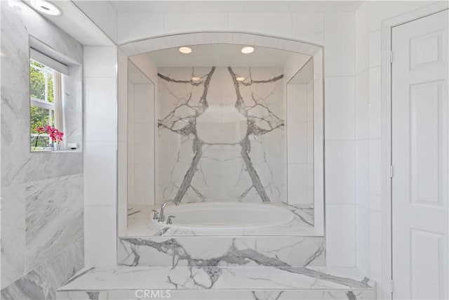 8851 Soothing Ct, Corona, CA 92883 - full bath featuring a tub with marble appearance and marble finish flooring