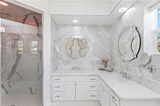 8851 Soothing Ct, Corona, CA 92883 - bathroom with double vanity, a marble finish shower, tile walls, and tasteful backsplash