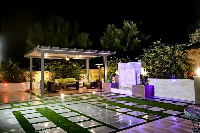 8851 Soothing Ct, Corona, CA 92883 - yard at twilight featuring an outdoor living space and a pergola