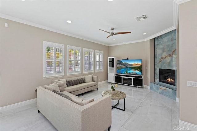 8851 Soothing Ct, Corona, CA 92883 - living room with crown molding, light marble finish flooring, a ceiling fan, recessed lighting, and baseboards