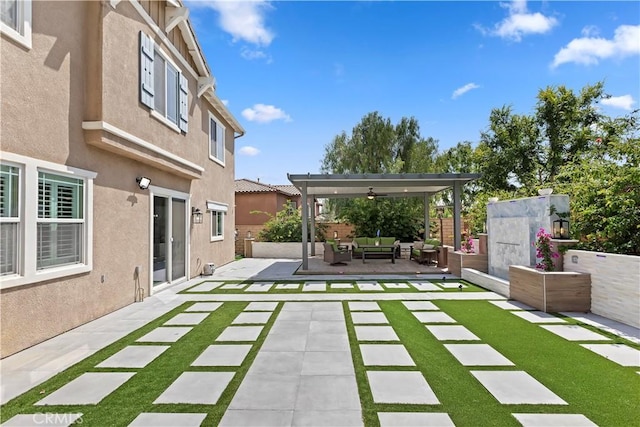 8851 Soothing Ct, Corona, CA 92883 - fenced backyard with an outdoor living space and a patio area