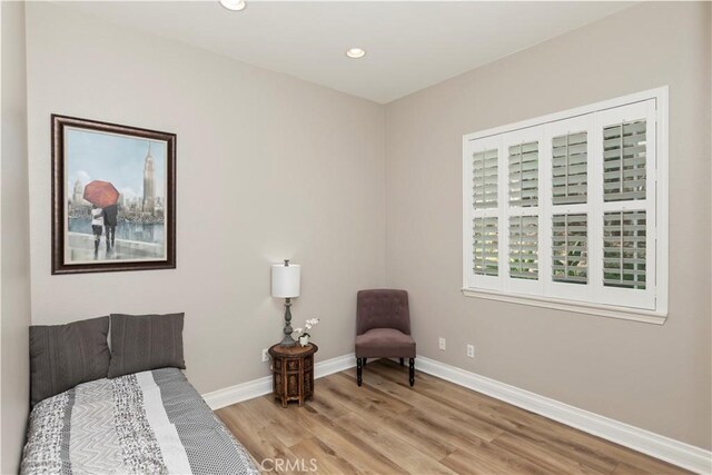 8851 Soothing Ct, Corona, CA 92883 - bedroom featuring light wood-style flooring, baseboards, and recessed lighting