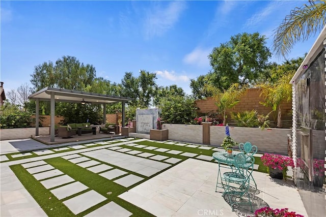 8851 Soothing Ct, Corona, CA 92883 - fenced backyard featuring outdoor lounge area and a patio