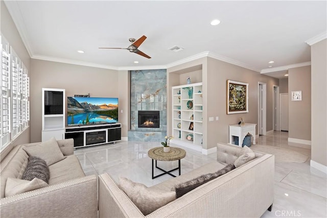 8851 Soothing Ct, Corona, CA 92883 - living room featuring a tile fireplace, ceiling fan, ornamental molding, recessed lighting, and baseboards