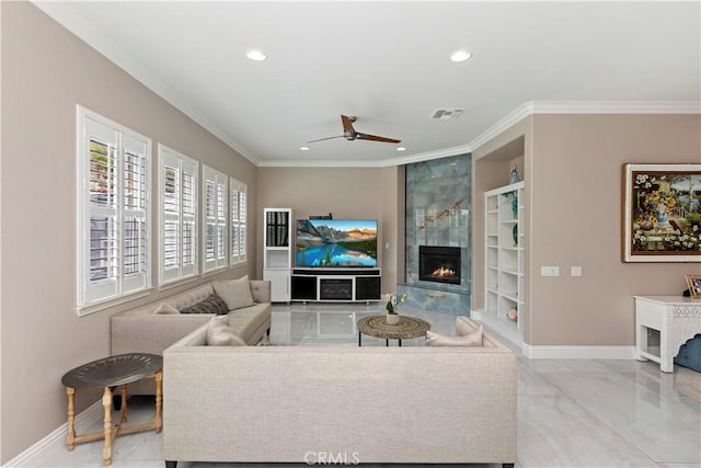 8851 Soothing Ct, Corona, CA 92883 - living area featuring a fireplace, built in features, ceiling fan, crown molding, and baseboards