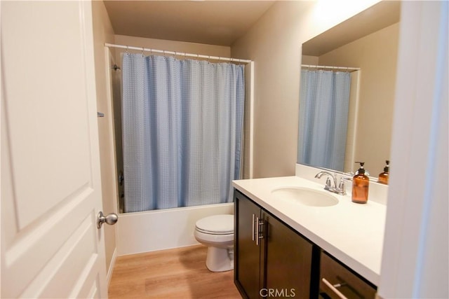 24649 Round Meadow Dr, Menifee, CA 92584 - bathroom featuring vanity, toilet, wood finished floors, and shower / bath combo