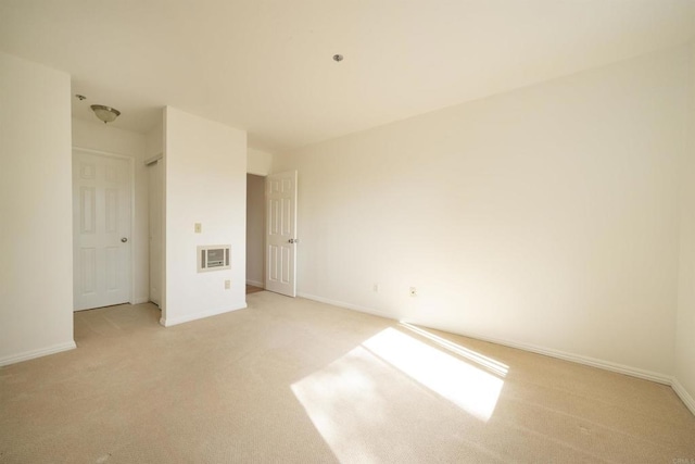 7753 Caminito Encanto Unit 102, Carlsbad, CA 92009 - unfurnished bedroom with light colored carpet and baseboards