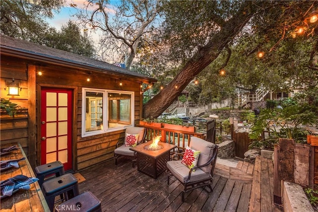 31342 Silverado Canyon Rd, Silverado Canyon, CA 92676 - deck at dusk with an outdoor fire pit